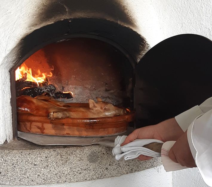 Cochinillo en horno de leña